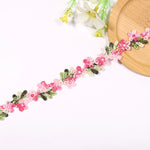 ruban decoratif brode fleurs motifs floraux couleur rouge rose vert blanc jaune solvable eau