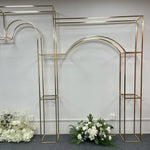 décoration mariage structure dorée arcs géométriques moderne élégante pièce fixations fleurs