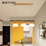 suspension lumineuse trois abat jours bois blanc laiteux moderne minimaliste chambre salon étude