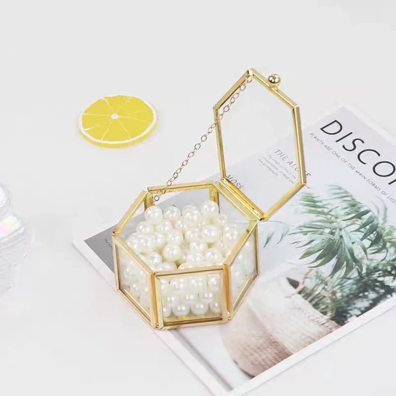 boîte bijoux hexagonale or transparent moderne élégante chaîne blanches rangement accessoires bijoux coffret cadeau