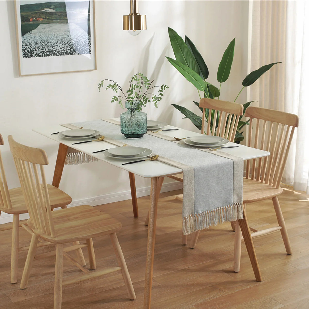 nappe tissée franges scandinave minimaliste gris beige vertebranches verte plante verte pot artwork encadré