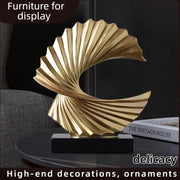 sculpture abstraite moderne or élégante spirale décoration intérieure contemporaine chambre salon