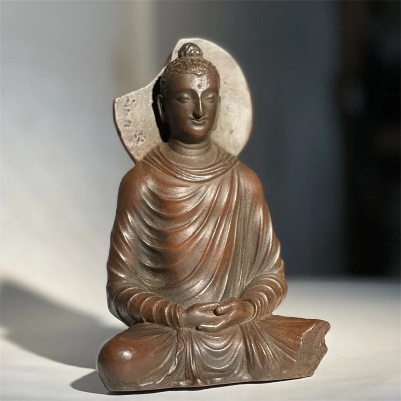 statue bouddha traditionnelle lisse brun foncé décoration maison religieuse ornement