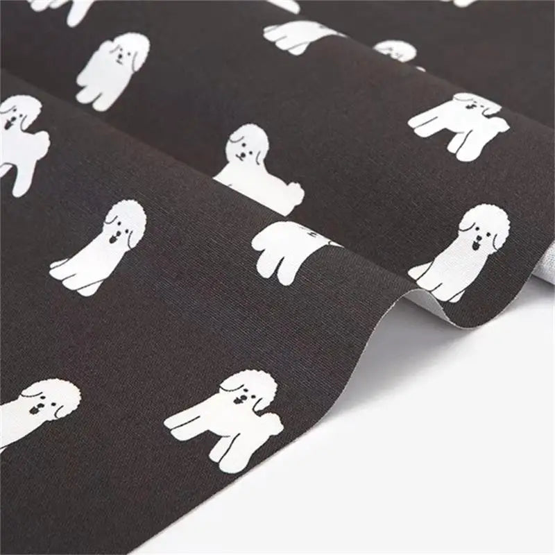 tablier coton imprimé chiens gris blanc moderne minimaliste poche poignées résistant intempéries Jacquard decoration