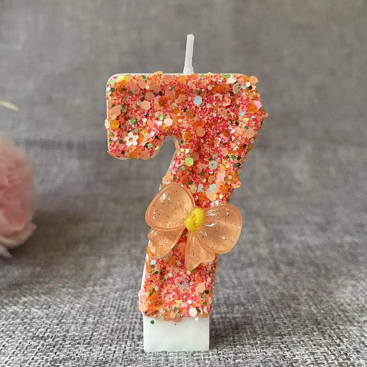 bougie anniversaire chiffre orange paillettes multicolores décoration brillante fleur centroide
