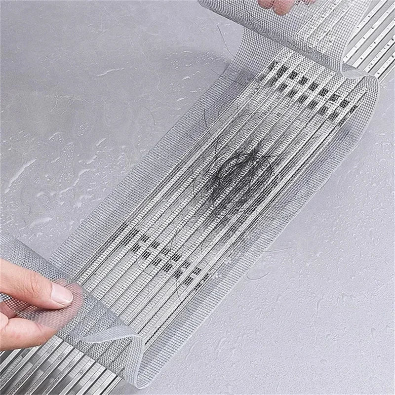 grille drainage adhésive maille fine gris clair moderne salle bain cuisine scie main auto