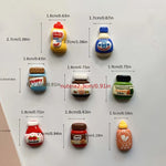 aimants réfrigérateur miniatures pots confiture sauces étiquettes marques couleurs vert bleu blanc rouge marron