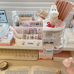 Boîte de rangement utilisée pour organiser stylos et fournitures