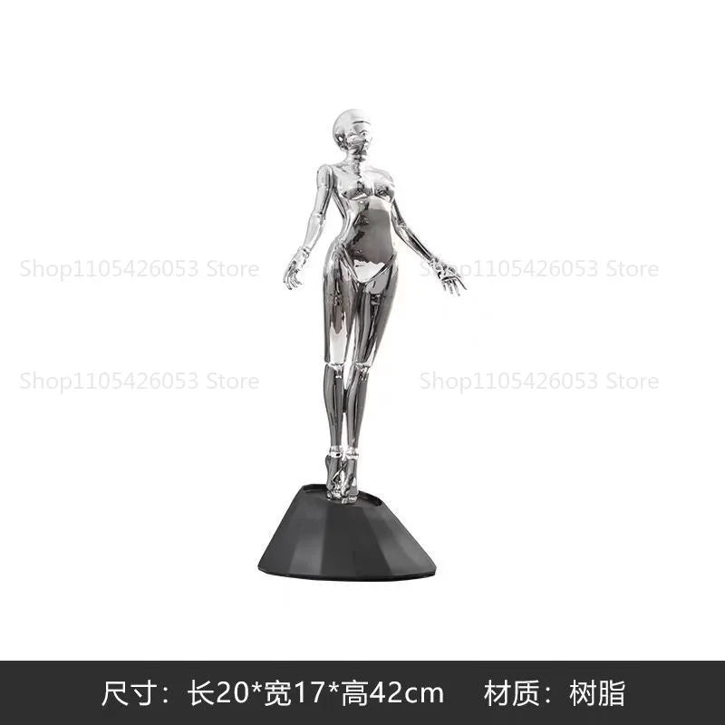 figurine humaine moderne argentée table chaises vases livres decoration intérieure robotique
