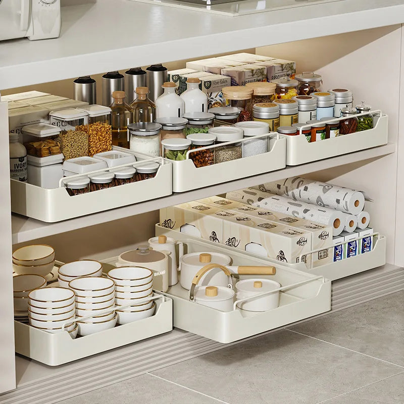 plateaux rangement coulissants cuisine blanc cassé bocaux verre pots bois boîtes alimentaires assiettes tasses