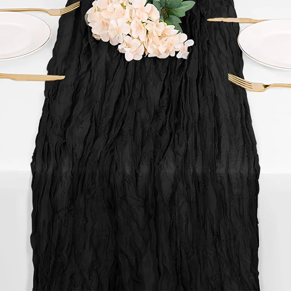 ruban table noir crêpe halloween décorations citrouilles crânes fourchettes assiettes bougies