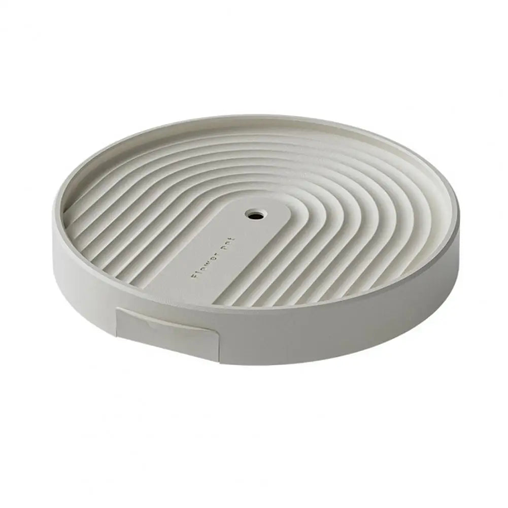 support plante roulettes collecte eau moderne gris clair rayures concentriquesversibleintérieur