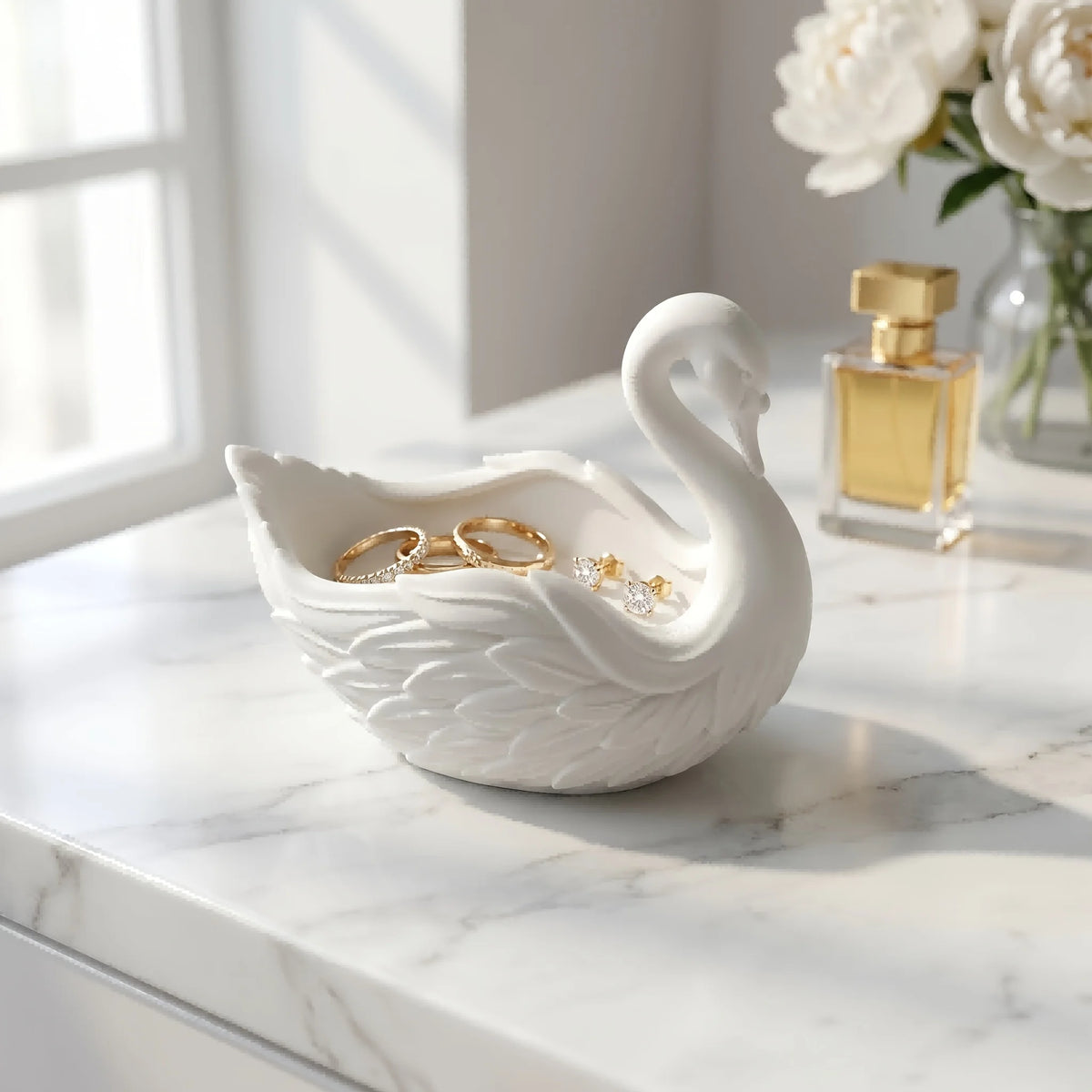 plateau rangement cygne blanc or détaillé plumes élégant bijoux bagues boucles doreille coiffeuse salle