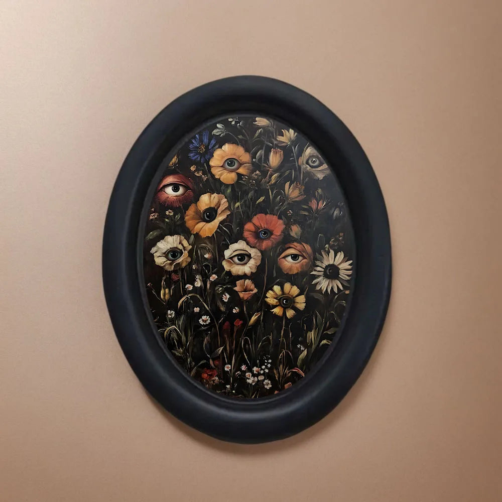 cadre photo ovale noir fleurs yeux stylisés classique decor mural gothique surréaliste erotique erotique