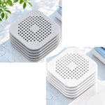 filtre bain réutilisable perforations géométriques adhésif blanc gris moderne respectueux environnement
