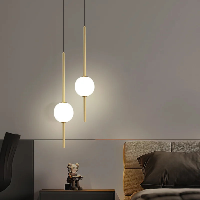 Suspension lumineuse moderne minimaliste blanc doré noir sphères translucides tiges métalliques