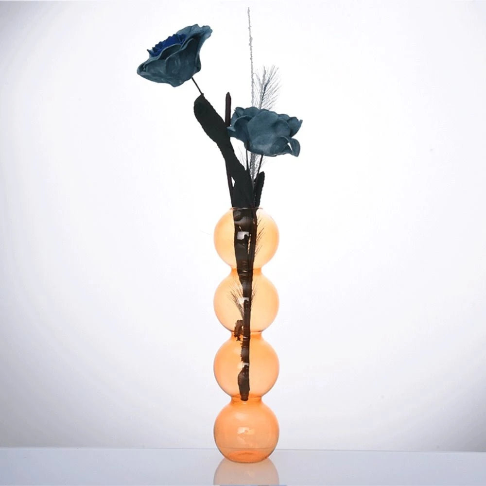 vase verre moderne transparent sphères empilées rose bleu vert orange minimaliste hydroponique fleur artificielle