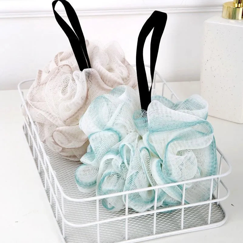 boule bain texture maille couleur beige rose vert moderne anneau noir panier blanc