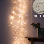 guirlande lumineuse cascade 600 led jaune or décoration intérieure noël chambre festive