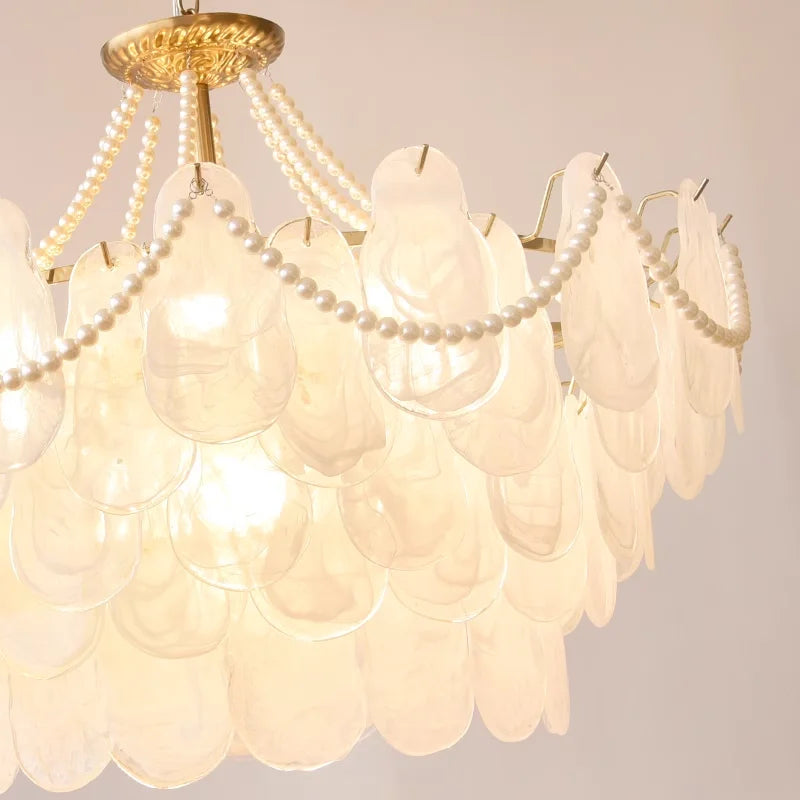 lustre cristal blanc doré coquillage organique élégant salon restaurant chambre