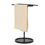 porte serviettes moderne noir mat serviette beige motif orange base circulaire salle bain acier