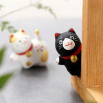 statuette chat céramique artisanale fleurs pois rubans couleurs vives décoration intérieure traditionnelle japonaise anniversaire