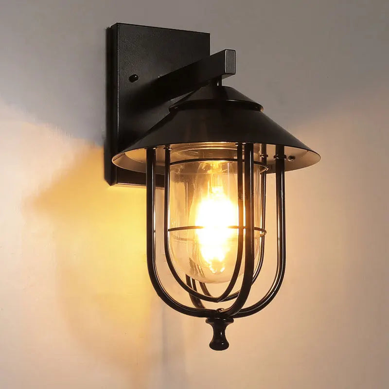 lampe murale vintage industrielle cage métallique verre transparent noir fixée mur plaque fixation