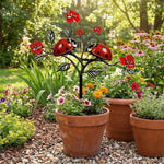 sculpture jardin moderne motifs fleurs insectes stylisés rouge noir vert blancextérieur decoration amusante fait
