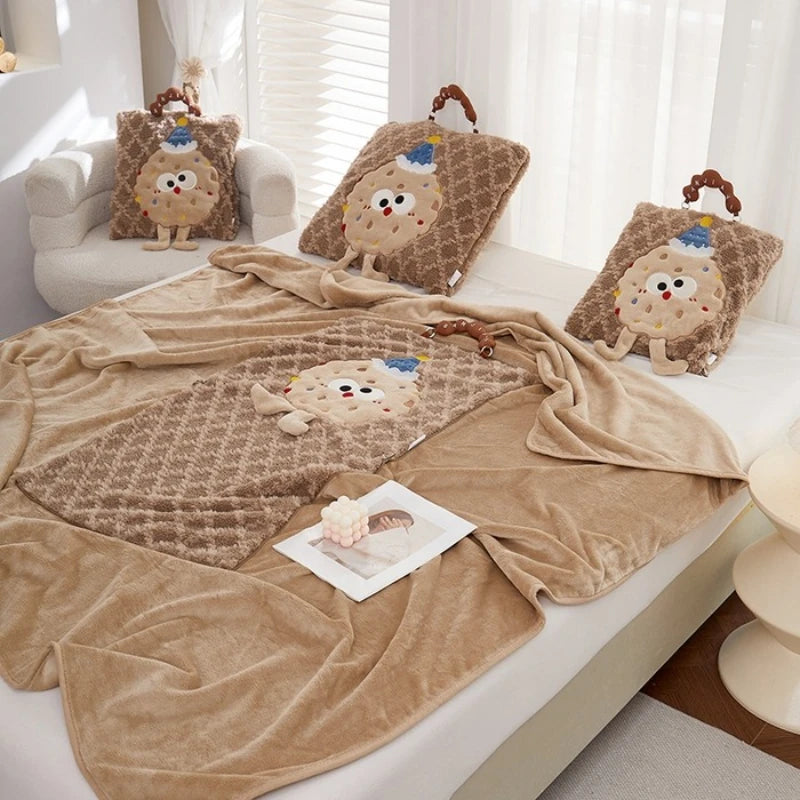 Peluches et couverture en tissu doux et moelleux, avec des motifs mignons d'adorables créatures, créant une ambiance chaleureuse et accueillante.