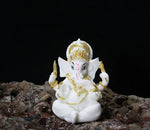 statue ganesha blanc doré relief sculpté artisanal cérémonie mariage anniversaire évenement