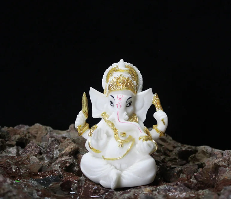 statue ganesha blanc doré relief sculpté artisanal cérémonie mariage anniversaire évenement