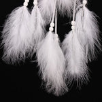 attrape rêves traditionnel blanc plumes blanches décoration maison amour pastorale matière organique