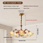 chandelier floral or rose led abat jours transparents têtes vintage