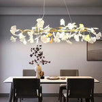 suspension lumineuse feuilles stylisées blanc doré contemporain opacité eyelets chambre salon