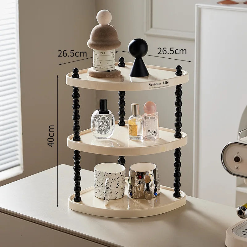 étagère trois niveaux moderne minimaliste blanc noir cosmétiques parfums tasses blancs