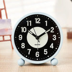 horloge table classique minmaliste noir blanc vert fluorescent numéros quartz pieds sphériques