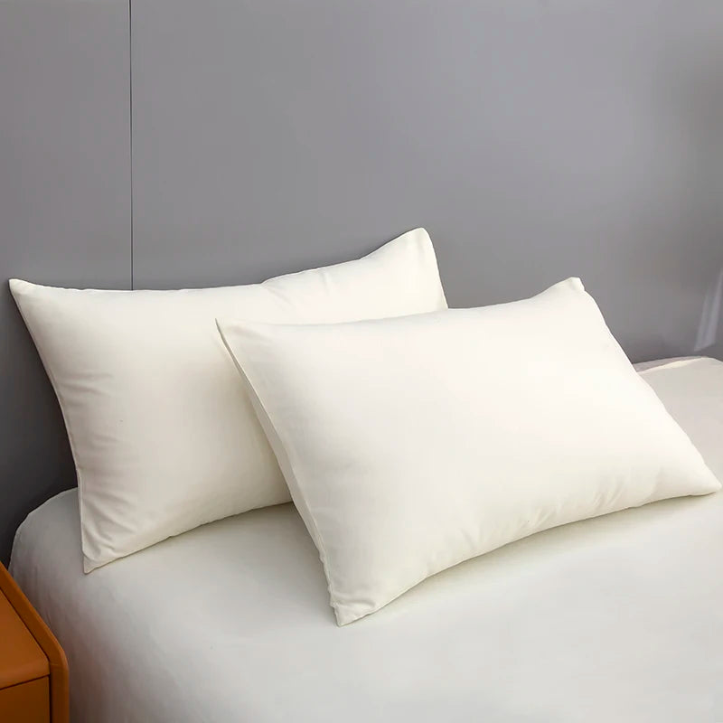 Taies d'oreiller assorties à la housse de couette beige