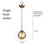 suspension lumineuse transparente moderne ampoule brillante câble noir minimaliste chambre salon étude