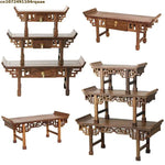 meuble bois chinois étagères sculptées pots fleurs figurine bouddha plante artificielle stand thé