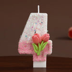 bougies forme chiffres blanc rose vert paillettes fleurs roses feuilles vertes festive tringle boîte