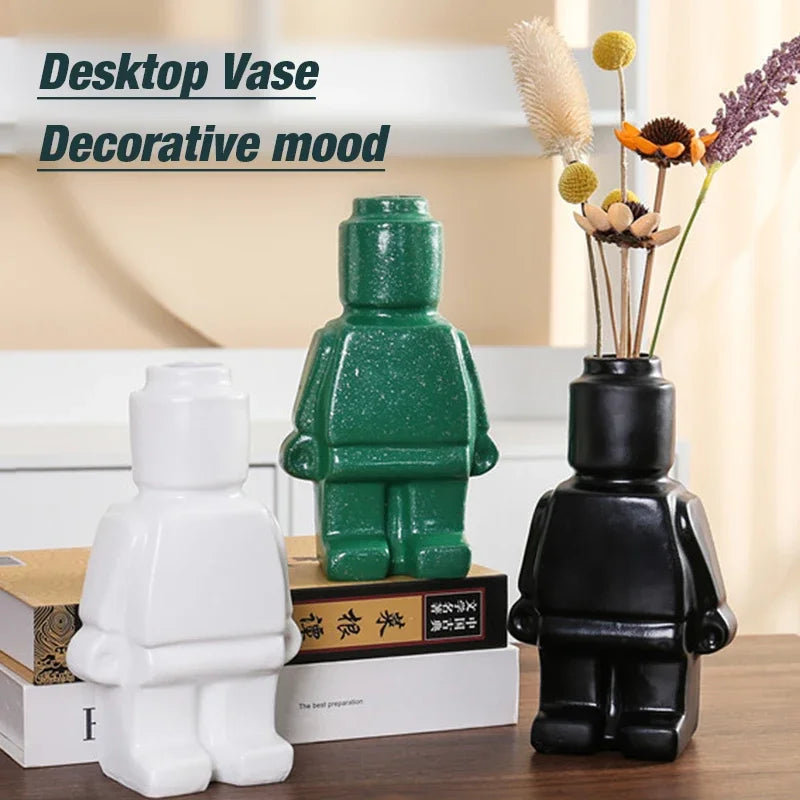 vases figurines lego blanc noir vert texture granuleuse deco ludique fleurs seches variées maison