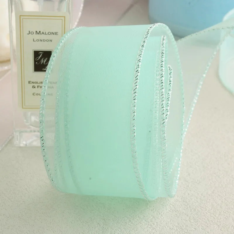 ruban polyester bordure brillante élégant semi transparent couleur unie rose clair bleu clair violet