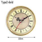horloges murales classiques quartz blanc doré bronze números romains cadran lignes noires decoration florale