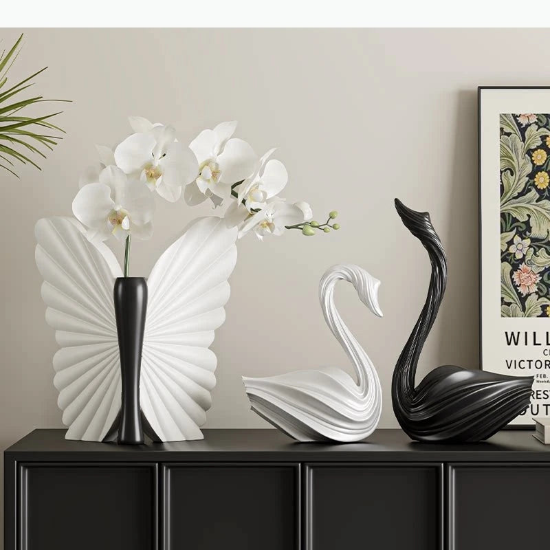 décoration intérieure statuette cygne noir blanc moderne élégante vase fleuri minimaliste