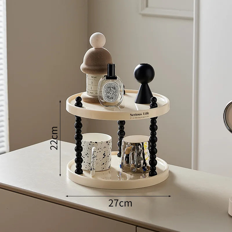 étagère trois niveaux moderne minimaliste blanc noir cosmétiques parfums tasses blancs