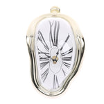 horloges murales surréalistes dali or noir argent chiffres romains aiguilles forme organique transparentes salon