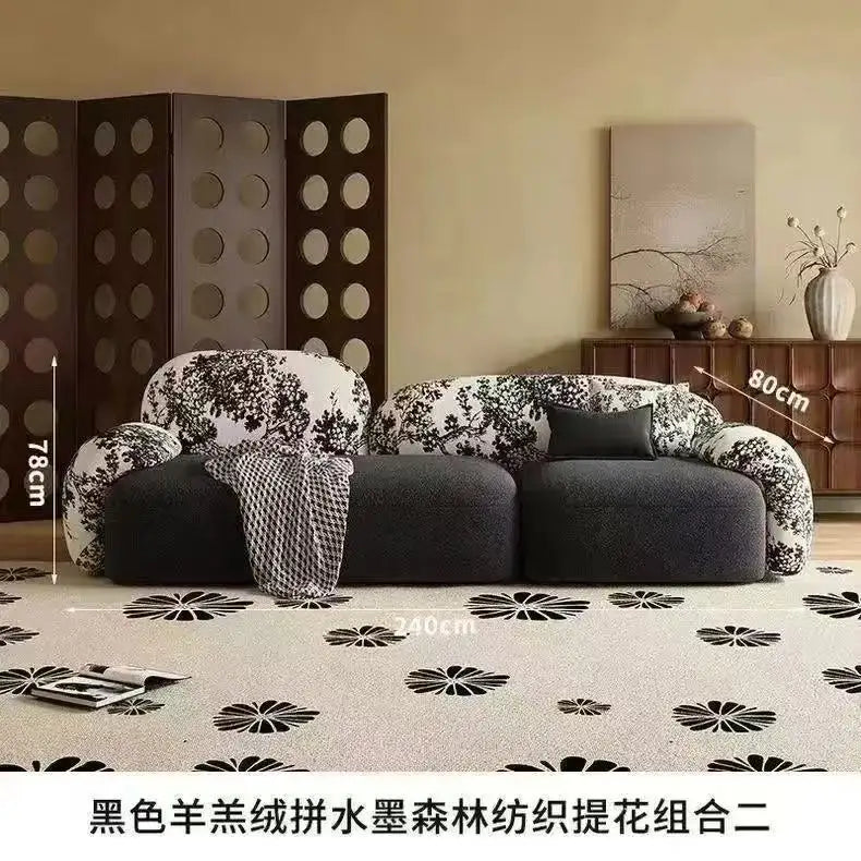 canapé moderne noir blanc fleurs motifs abstraits coussins plateau bois minimaliste italien scandinave