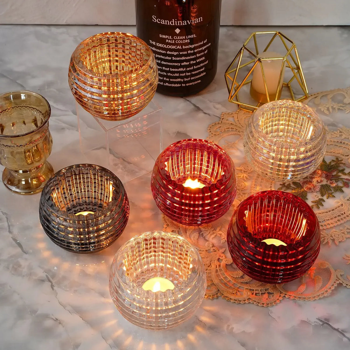 supports bougies transparents moderne rayures horizontales bougie rouge doréDecoration maison fêtes