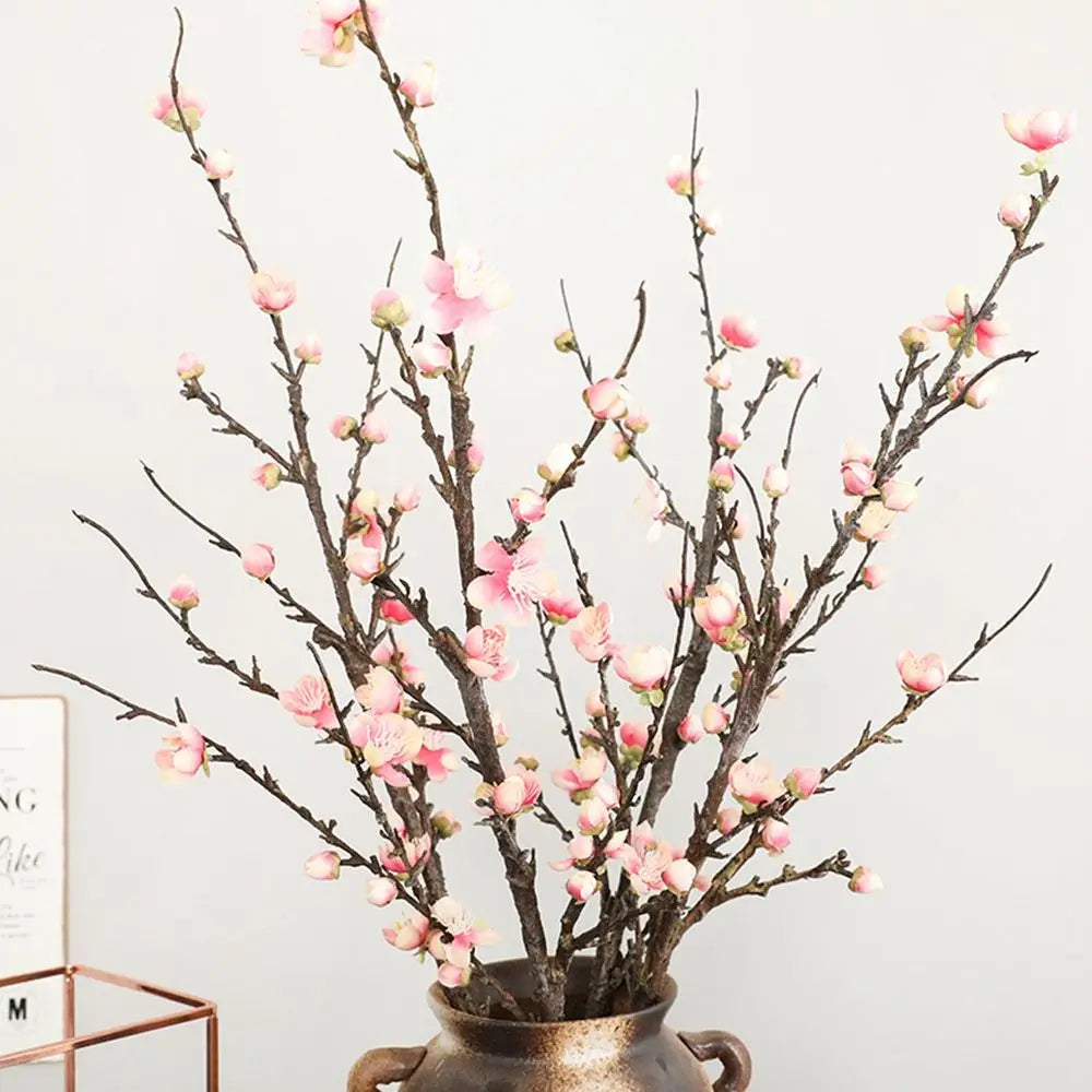 décoration intérieure bouquet fleurs prunier artificielles rose blanches vase transparent minimaliste asian