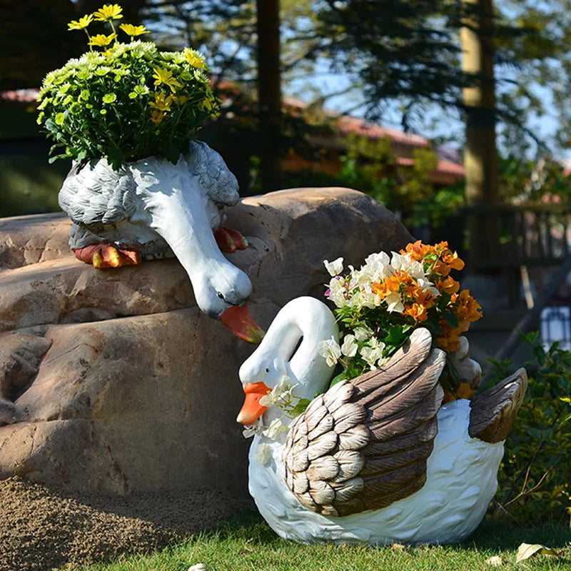statue cygne pot fleur jardin blanc plumes décoratif fleurs diverses couleurs rock texture rustic